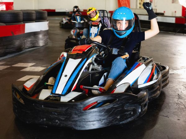 Kids riding indoor go karts